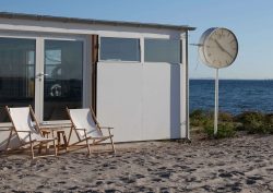 deckchairs on the beach in Denmark in front of the Arne Jacobsen bathhouse