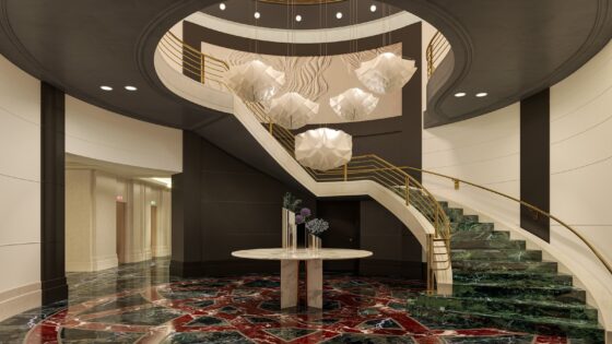 sweeping staircase and statement lighting in sofitel New York