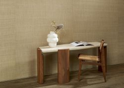 wooden table and chair with white vase against natural silk wall covering from Arte