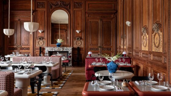 wood panelled dining room in english manor house with restaurant setting