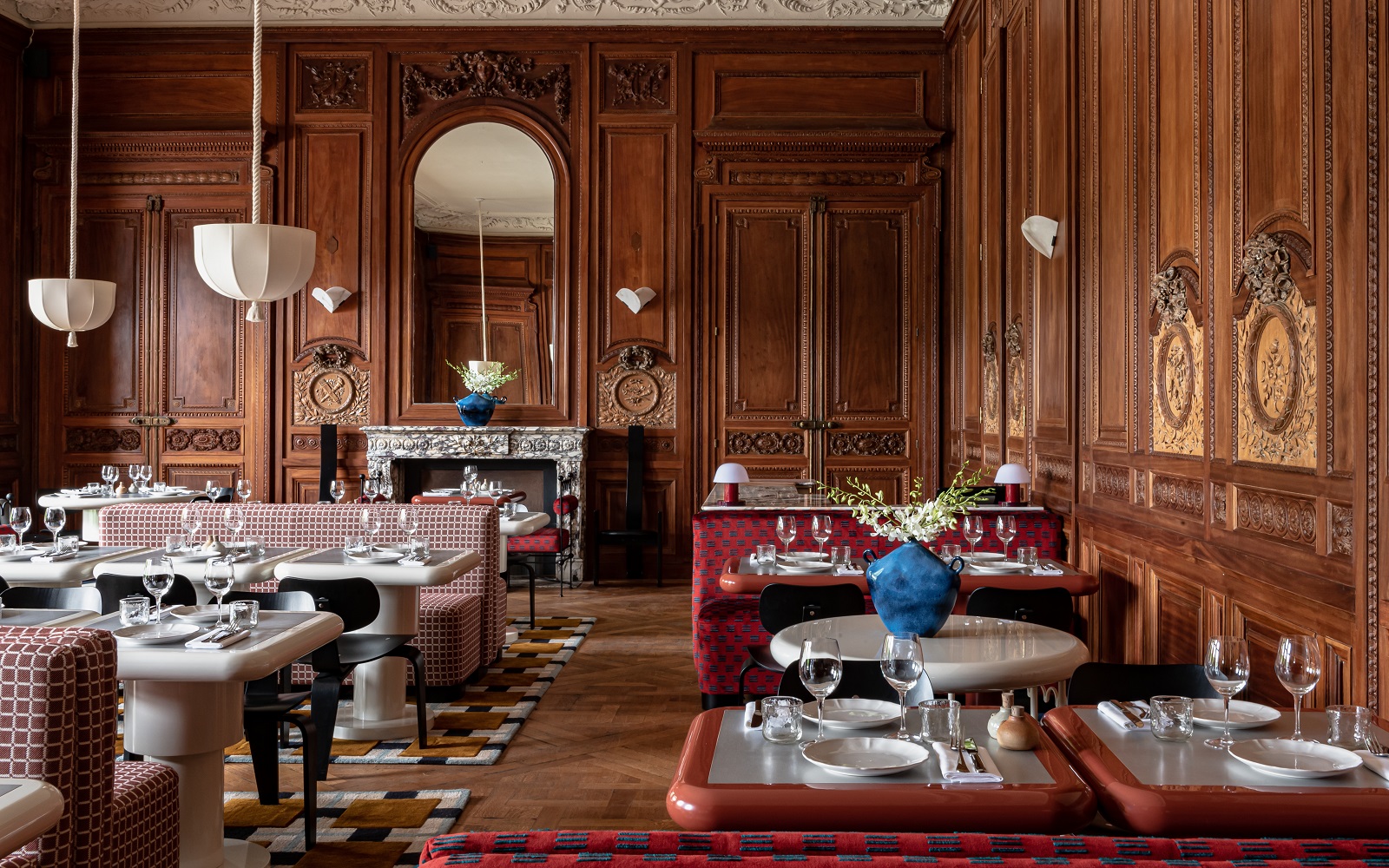 wood panelled dining room in english manor house with restaurant setting