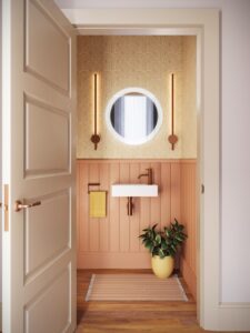 door open on to cloakroom with mirror and brushed bronze bathroom fittings