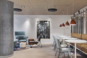 seating and dining area in a natural colour palette in the hotel