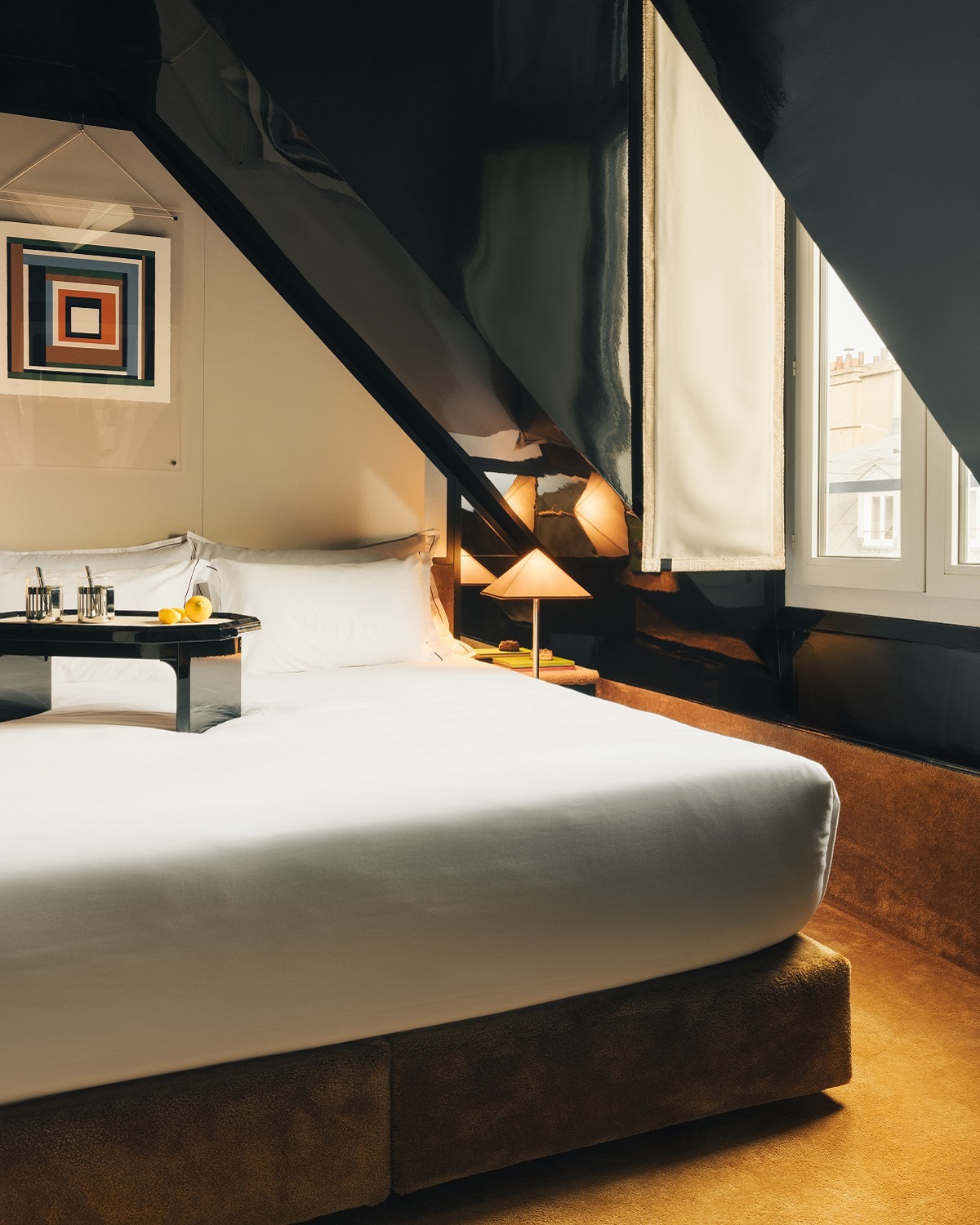 angular bay window in Hotel Chateau d'Eau guestroom in Paris