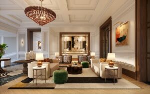 cream couches under glass chandelier with patterned woven carpet in cape grace lobby