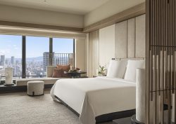 guestroom with view across Osaka in four Seasons Hotel Osaka