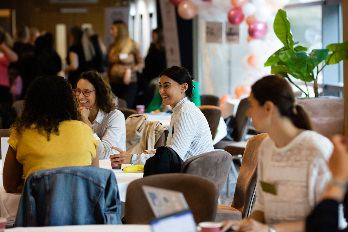 Woman networking at Summit