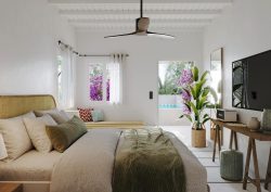 white beamed ceiling, fan and natural surfaces in guestroom at Numo Mykonos