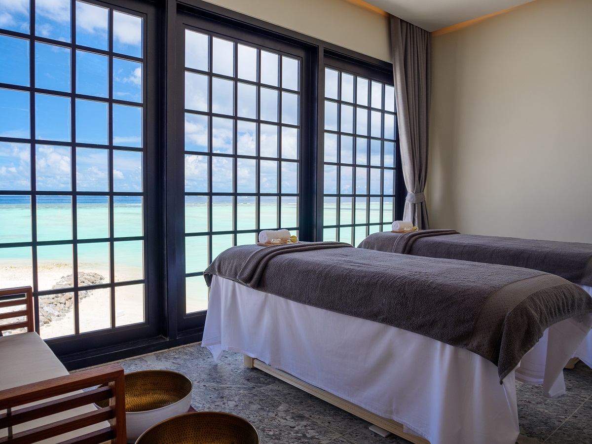 spa treatment room at SAii Lagoon Maldives with views over the water