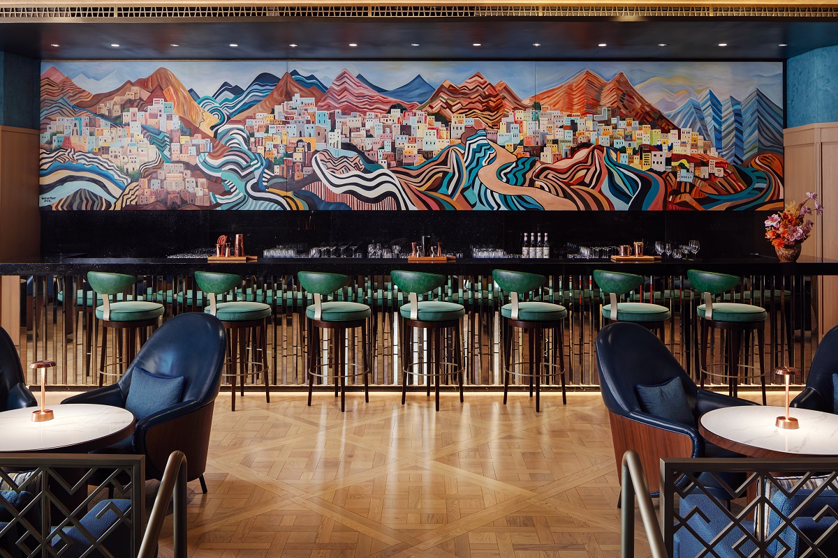 bar in St Regis Oman with mural by Omani artist Hassan Meer