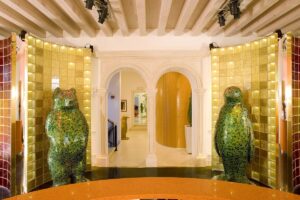 giant green glass mosaic bear sculpture