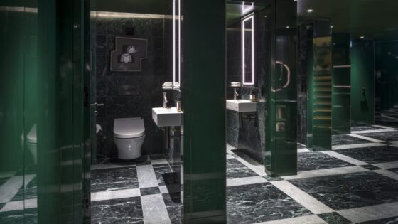 green marble bathroom with TOTO fittings at the Londoner hotel